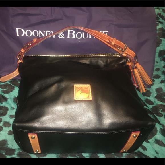 Dooney and Bourke Large Leather Hobo. - Picture 1 of 10